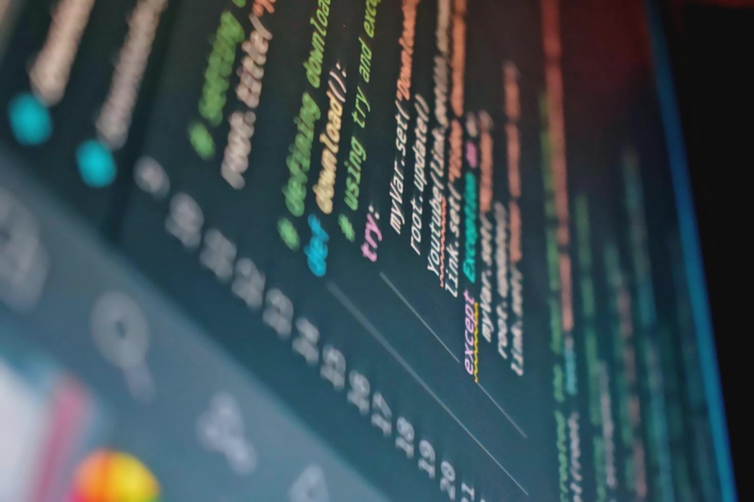 Interactive programming workshop showing students debugging object-oriented code together